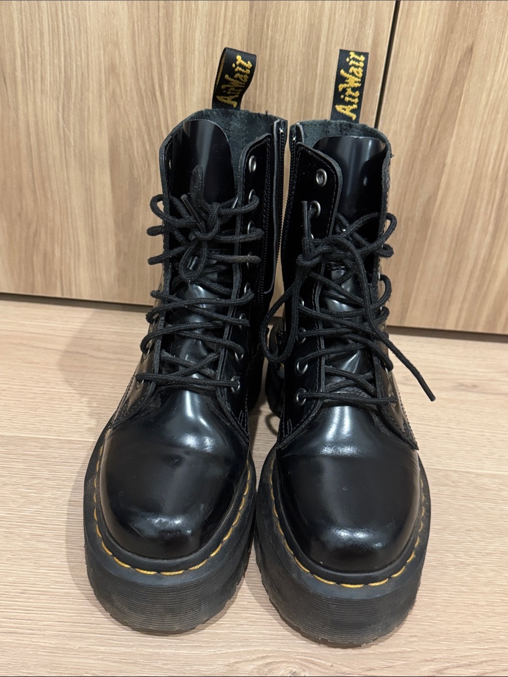 Dr. Martens Black Leather Platform Lace-Up Boots with Yellow Stitching